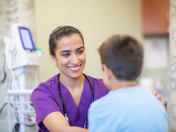 Healthcare worker taking care of child