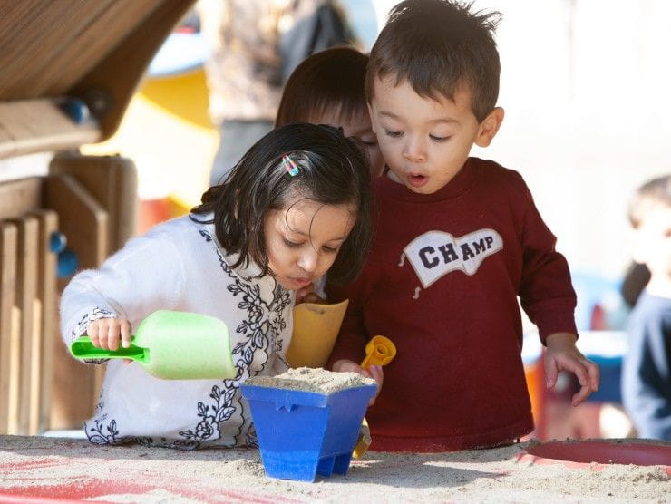 children playing with sand 