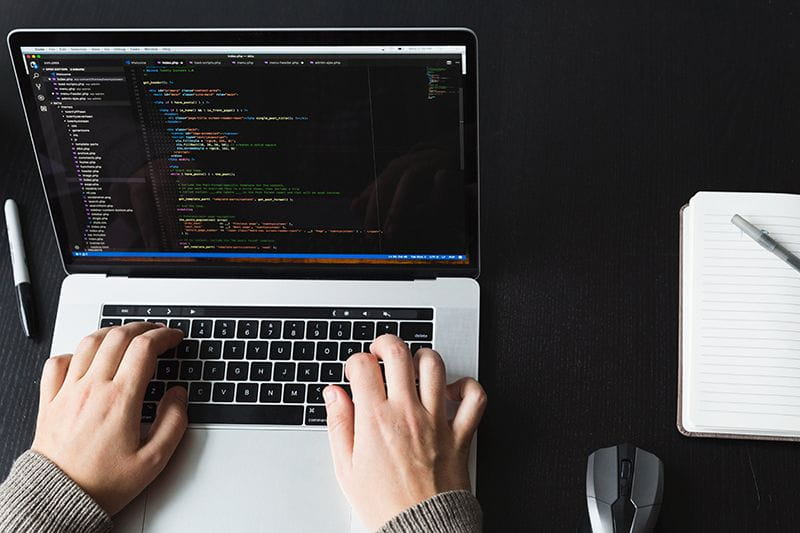 Developer coding using a computer science degree