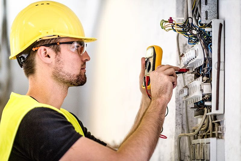 Man working with a circuit board