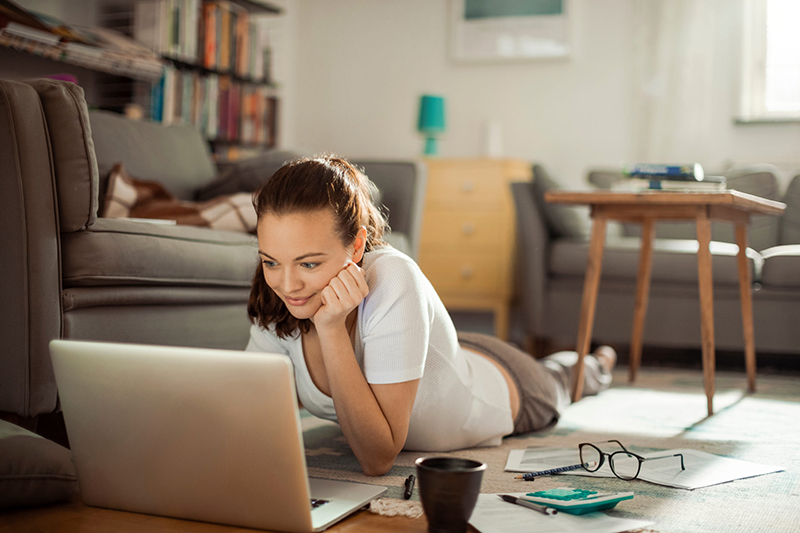 Young professional furthering her employee education from home