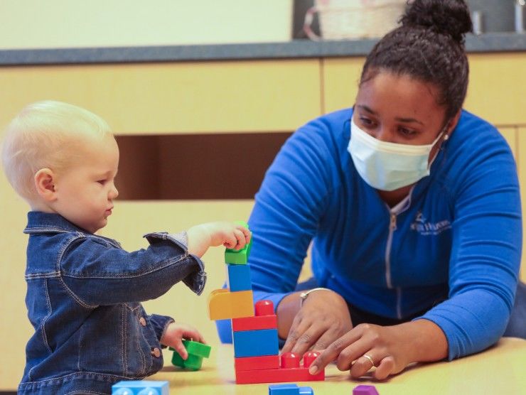 teacher with infant 