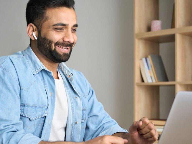 A male professional working from his home office