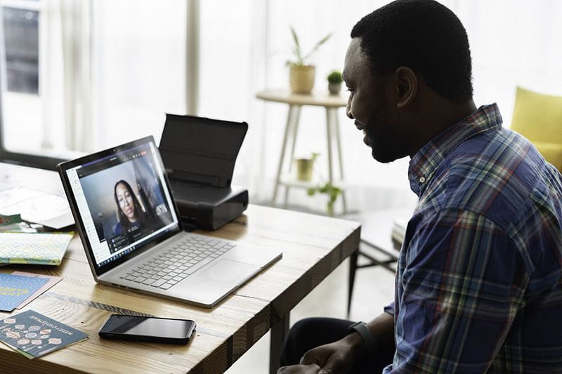 A man interviewing virtually for an HR position