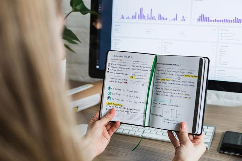 Young professional working and studying for her degree