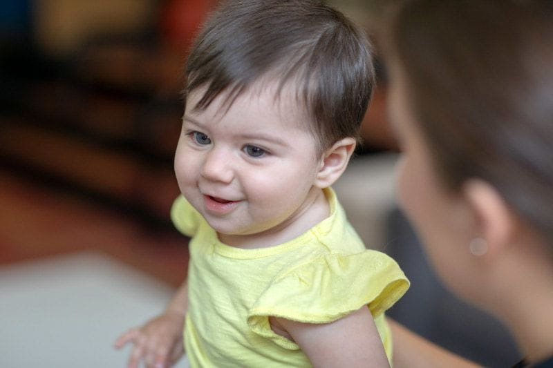 Mom caring for her infant at home instead of working